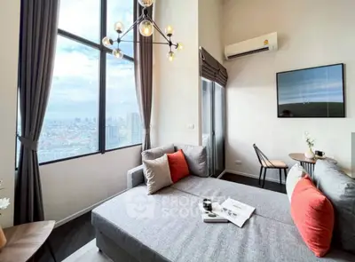 Stunning high-rise living room with panoramic city views and modern decor