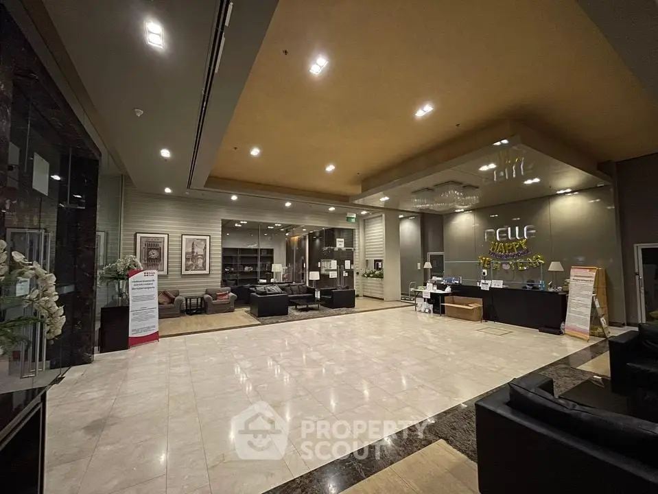 Luxurious hotel lobby with modern decor and spacious seating area
