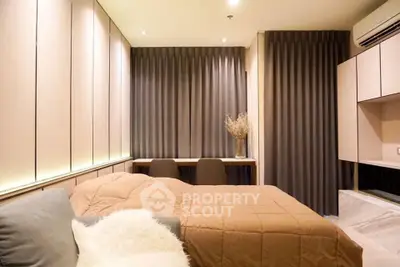 Cozy modern bedroom with stylish decor and ambient lighting