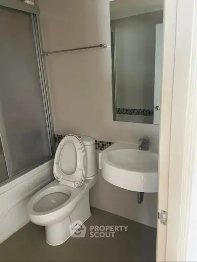 Modern bathroom with sleek fixtures and a minimalist design