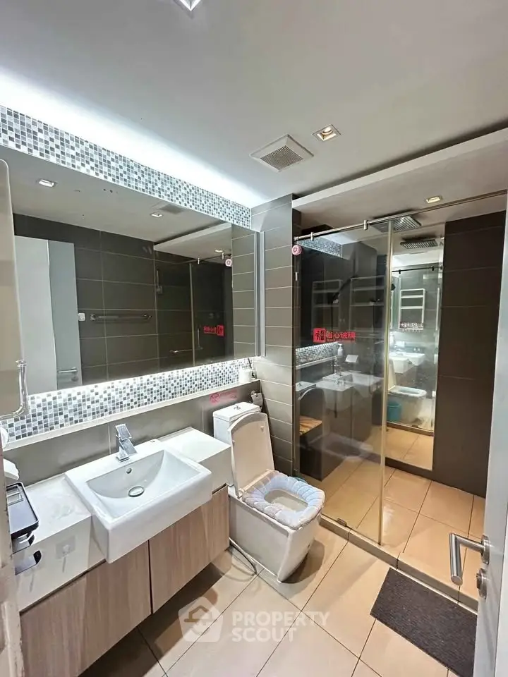 Modern bathroom with sleek design and spacious shower area