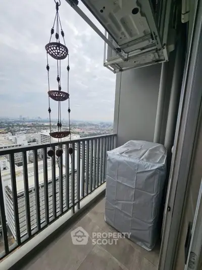 Charming balcony with city view, perfect for relaxation and enjoying the skyline.