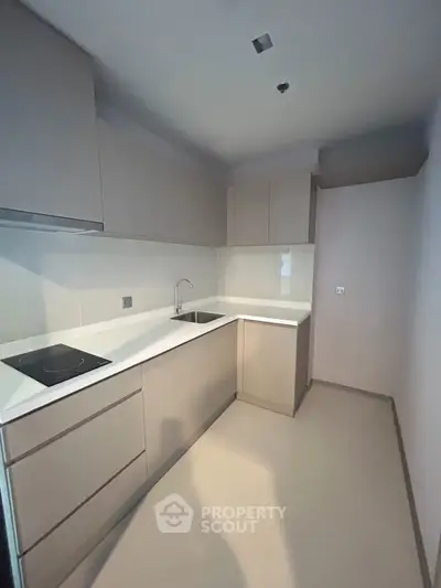 Modern kitchen with sleek design and built-in appliances