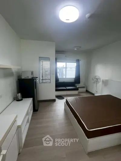 Modern studio apartment with minimalist design and natural light