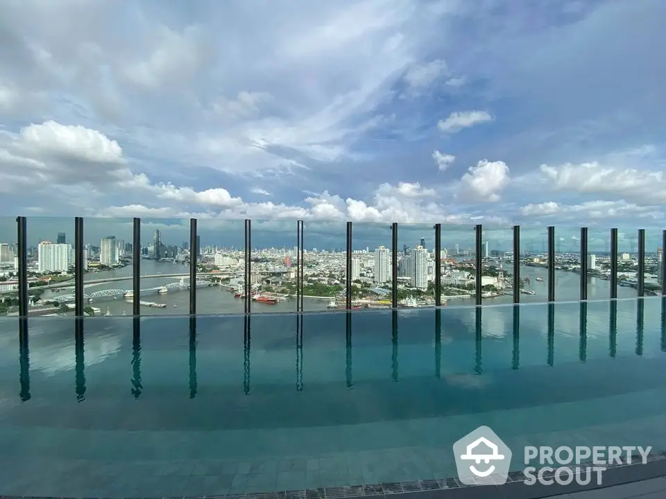 Stunning rooftop infinity pool with panoramic city skyline view