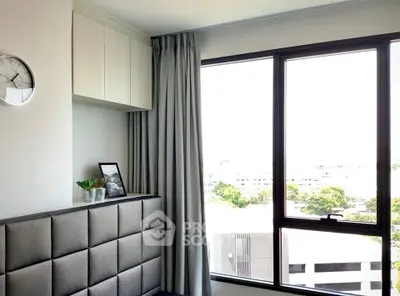 Modern bedroom with large window and stylish decor