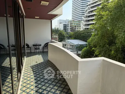 Spacious balcony with city view and stylish tile flooring