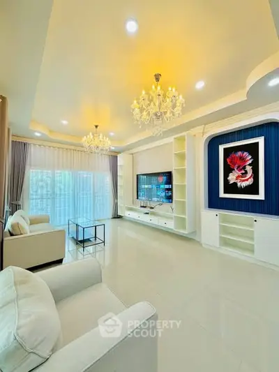 Luxurious living room with elegant chandeliers and modern decor