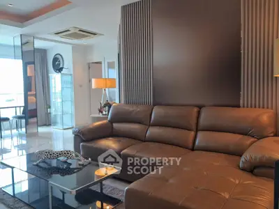Luxurious modern living room with leather sofa and stylish decor