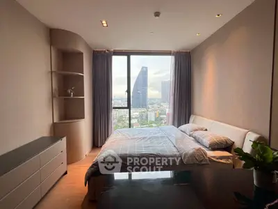 Luxurious bedroom with stunning city view and modern furnishings