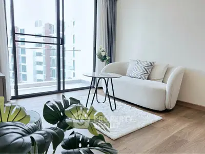Modern living room with elegant sofa and city view balcony