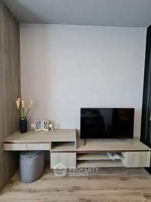 Modern living room with sleek TV stand and minimalist decor