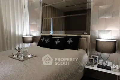 Luxurious bedroom with elegant decor and ambient lighting, perfect for relaxation.