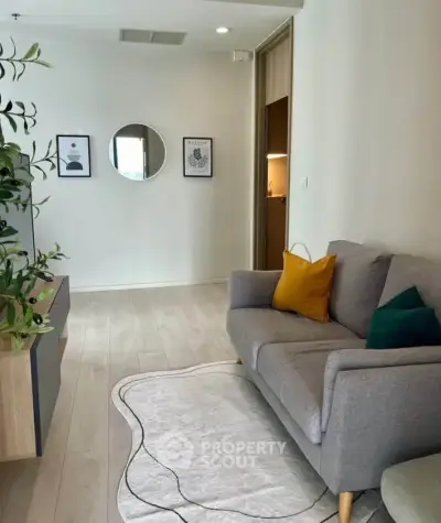 Modern living room with stylish decor and cozy seating area