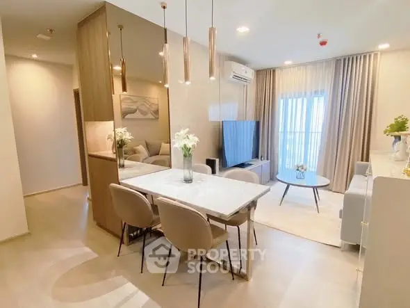 Modern living room with elegant dining area and stylish decor