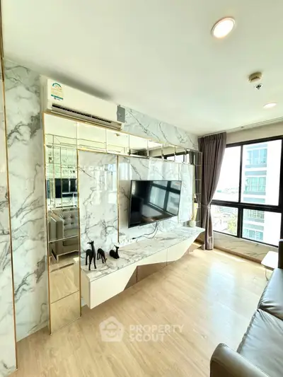 Luxurious modern living room with marble accents and large windows offering city views.