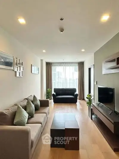 Spacious modern living room with elegant decor and natural light