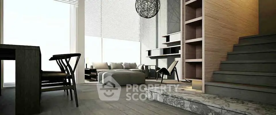 Modern living room with stylish furniture and open layout, featuring a cozy seating area and contemporary decor.