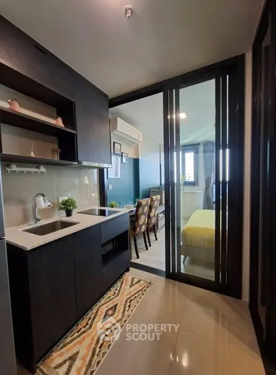 Modern compact kitchen with open layout and stylish decor