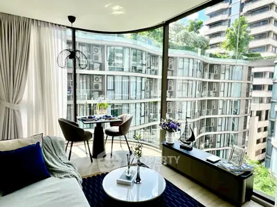 Luxurious modern living room with panoramic city view and elegant decor