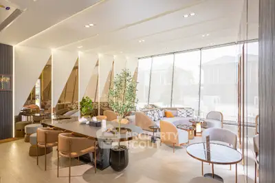 Luxurious modern living room with elegant furniture and large windows