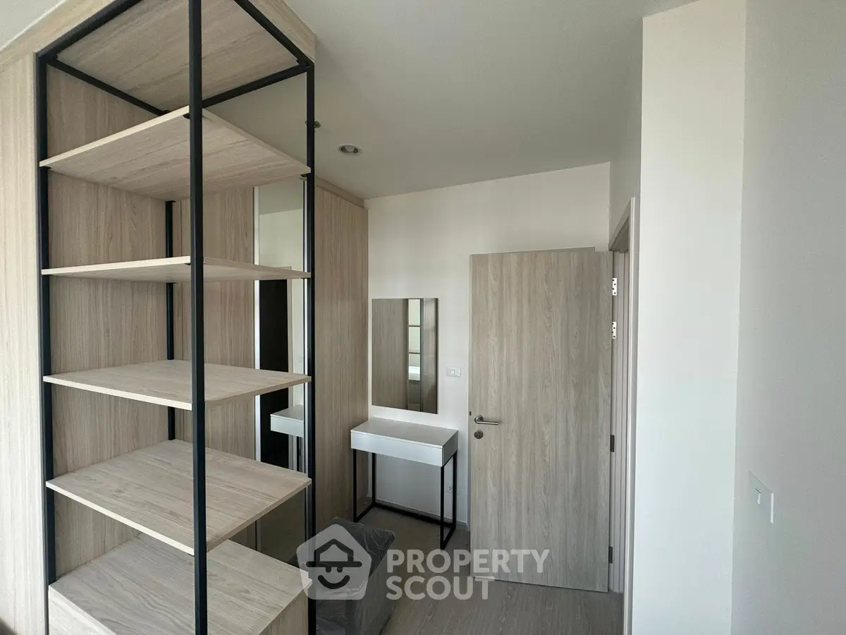 Modern minimalist bedroom with wooden shelves and vanity desk