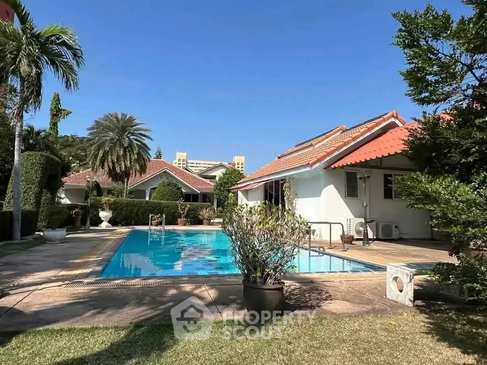 Charming villa with private pool and lush garden, perfect for luxury living.