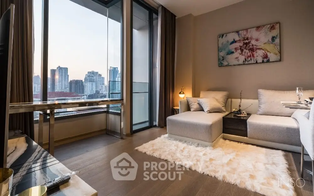 Luxurious living room with plush seating, elegant decor, and breathtaking cityscape views through floor-to-ceiling windows, perfect for urban living.