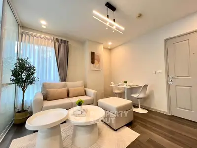 Modern living room with stylish furniture and natural light