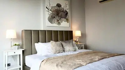 Elegant bedroom with modern decor and cozy lighting