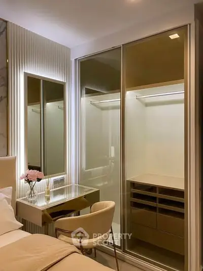 Luxurious bedroom with elegant walk-in closet and modern decor