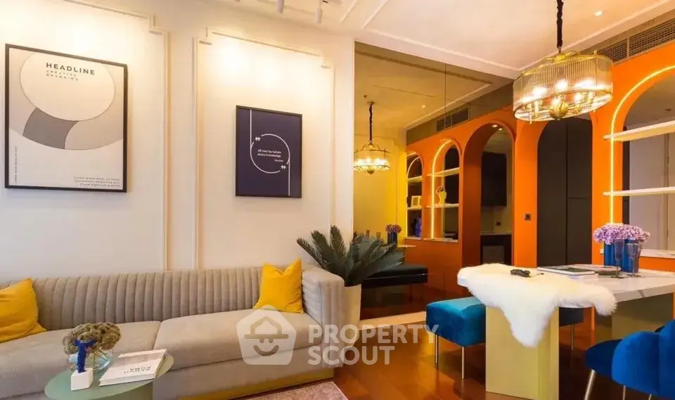 Stylish modern living room with vibrant orange accents and elegant lighting