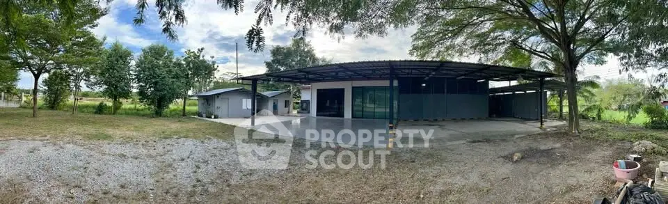 Spacious industrial property with large outdoor area and modern facilities, ideal for business operations.
