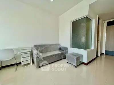 Modern living room with minimalist furniture and sleek design, perfect for urban living.