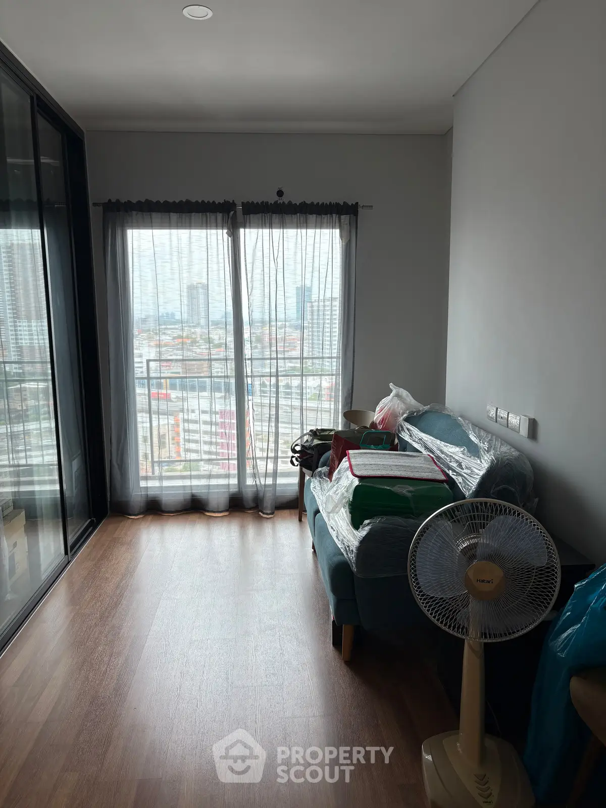 Cozy living room with city view and modern furnishings