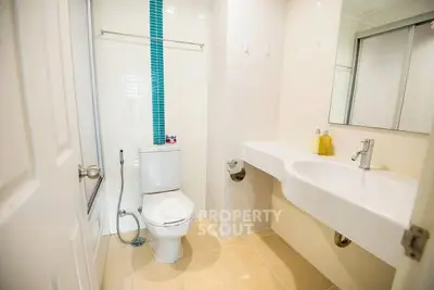 Modern bathroom with sleek fixtures and stylish tile accents