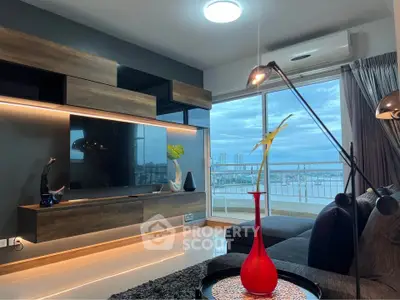 Modern living room with sleek furniture and stunning city view through large windows.