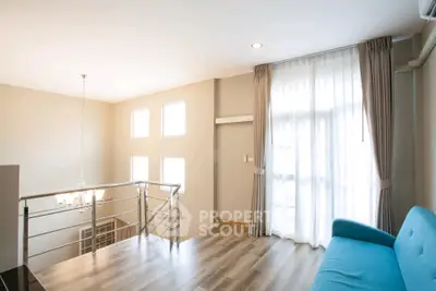 Bright and airy living room with modern decor and large windows