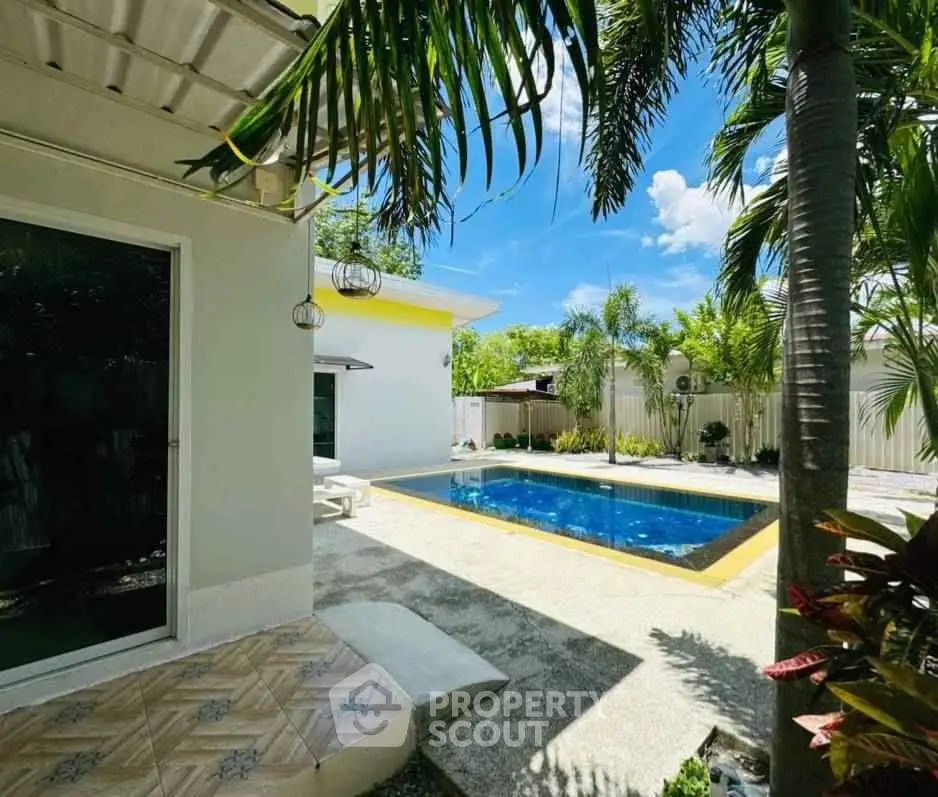 Stunning tropical villa with private pool and lush garden, perfect for relaxation and luxury living.