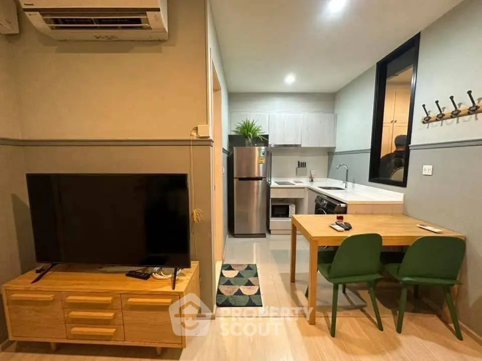 Modern apartment interior with cozy living area and compact kitchen