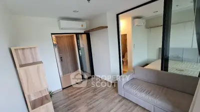 Modern apartment interior with cozy living room and bedroom view