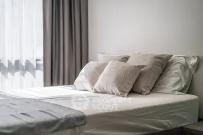 Cozy and inviting bedroom with elegant decor and natural light
