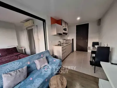 Modern studio apartment with open kitchen and cozy living area