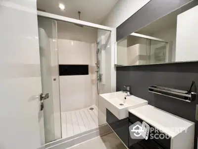 Modern bathroom with sleek design and spacious shower area