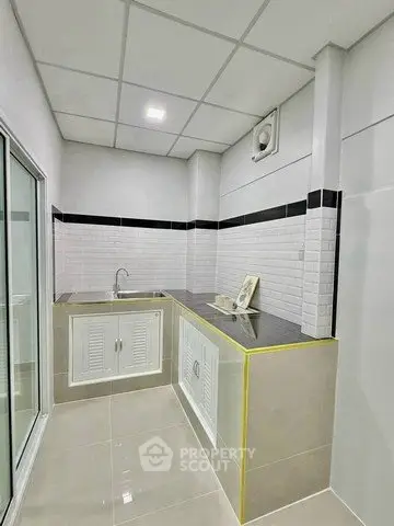 Modern kitchen with sleek design and ample counter space