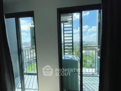 Stunning balcony view with cityscape and lush greenery, perfect for relaxation and enjoying the outdoors.