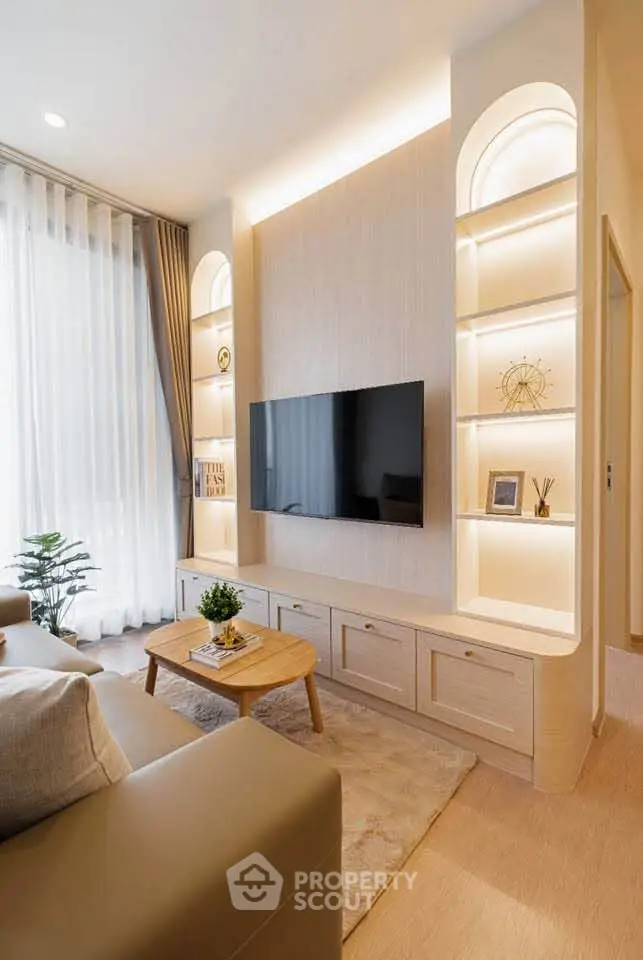 Modern living room with stylish built-in shelves and flat-screen TV