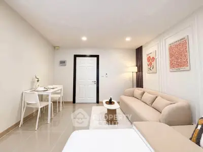 Modern living room with elegant decor and cozy seating area