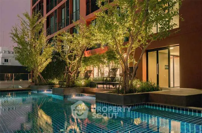 Luxurious urban apartment with stunning poolside view and modern architecture.