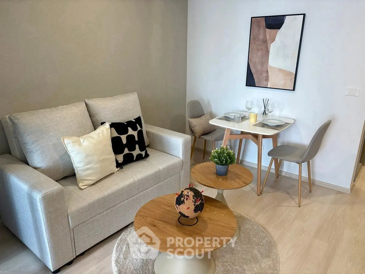 Modern living room with stylish decor and cozy dining area